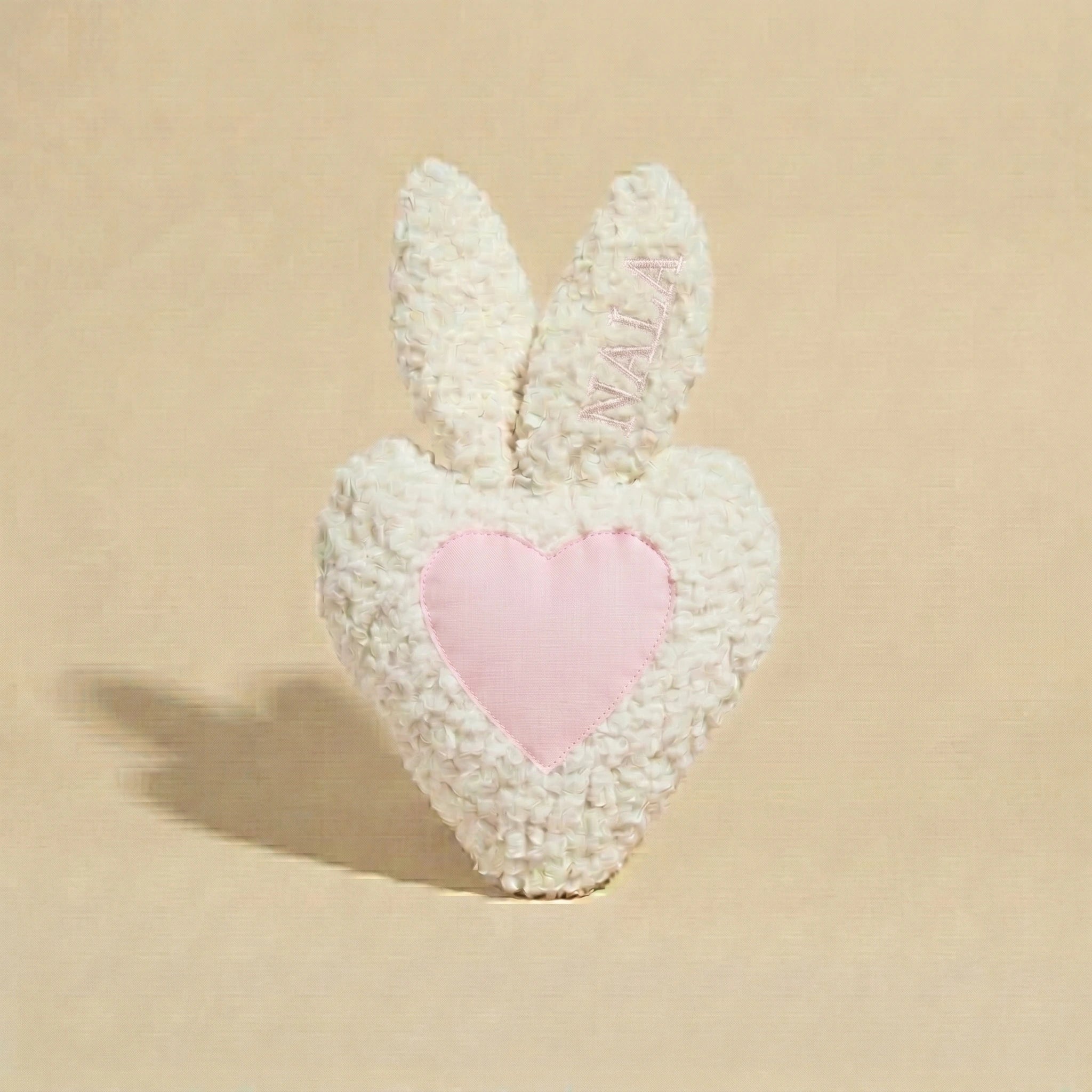 
Peluche apaisante rose et blanche brodée pour chien avec poche odeur du maître
